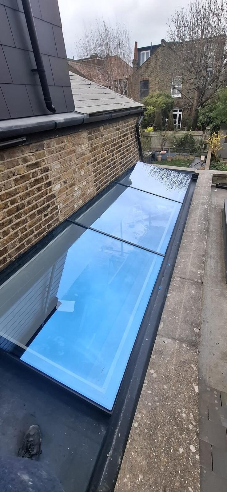 Flat glass rooflight installed on a London side-return roof